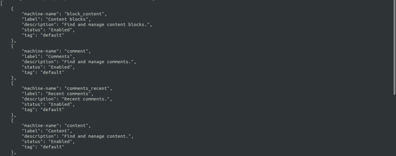 A screenshot of a command line terminal displaying the results of running a drush views:list --format=json command.